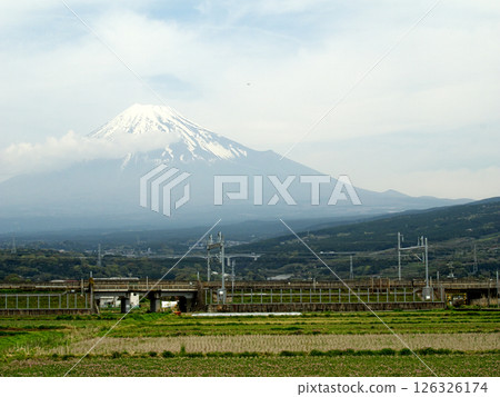 Snowy Mount Fuji as seen from the Shinkansen Snowy Mount Fuji as seen from the Shinkansen 126326174