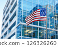 US America national flag and government building with skyscrapers. 126326260