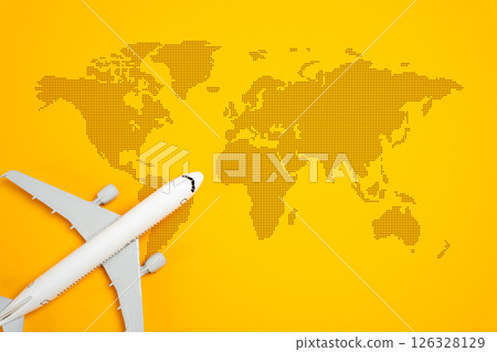 Airplane and world map. Passenger air transportation. International flights. World tourism. Worldwide passenger movement, globalization, and the importance of efficient transportation networks. 126328129
