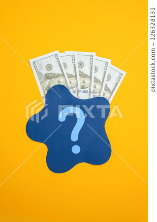 Dollar bills behind blue spot. Concept of dirty money or its unclear origin. Legalization of money, money laundering. Financial transparency, illegal transactions. Financial investigations. Dollar bills behind blue spot. Concept of dirty money or its unclear origin. Legalization of money, money laundering. Financial transparency, illegal transactions. Financial investigations. 126328131