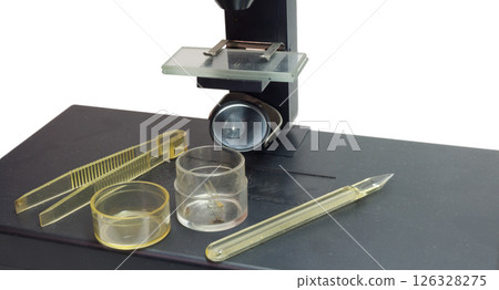 microscope, jars and accessories. stage, slides pair, round mirror reflector, transparent tweezers with ribbed handles, adjustment spatula-dropper. on white background microscope, jars and accessories. stage, slides pair, round mirror reflector, transparent tweezers with ribbed handles, adjustment spatula-dropper. on white background 126328275