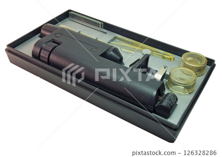 educational microscope in portable case for storing with tools and asseseories. isolated on white background 126328286
