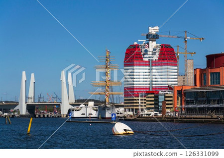 The Lilla Bommen building called Lipstick at harbor on Gota river bank, Gothenburg, Sweden, sunny day The Lilla Bommen building called Lipstick at harbor on Gota river bank, Gothenburg, Sweden, sunny day 126331099