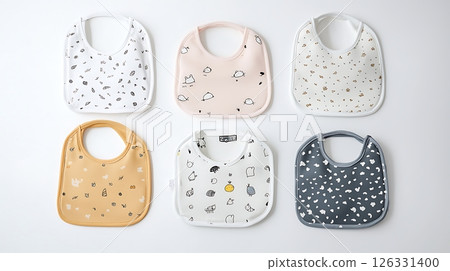 A row of baby bibs with different patterns and colors 126331400