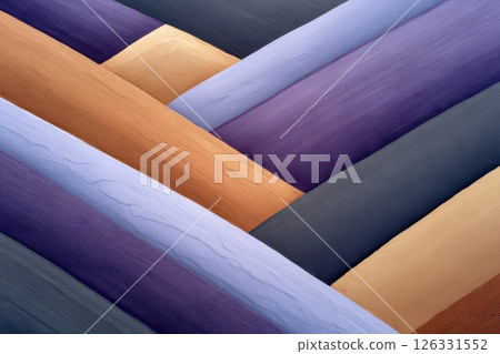 An abstract aerial photograph of sand dunes creating a mesmerizing geometric pattern. The image features diagonal lines in contrasting colors of deep purple, lavender blue, sandy beige. 126331552