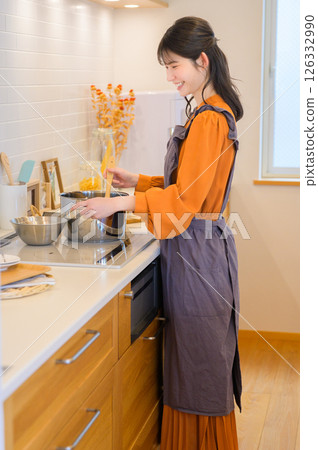 Japanese woman cooking in the kitchen 126332990