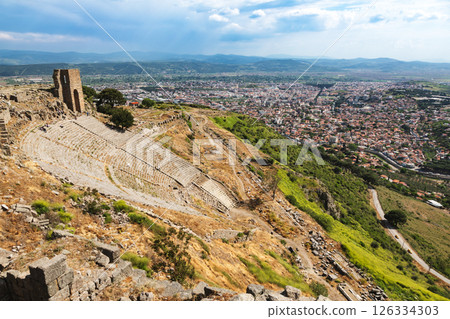 Panoramic view of ancient Hellenistic theatre on Pergamon acropolis overlooking modern city of Bergama Turkey 126334303