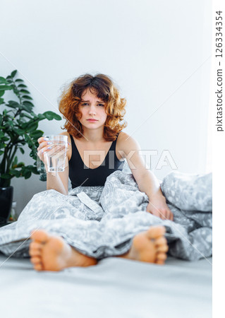 morning headache woman hangover 126334354
