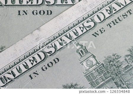 genuine American banknote with a face value of one hundred US dollars, part of a paper bill of American dollars genuine American banknote with a face value of one hundred US dollars, part of a paper bill of American dollars 126334848