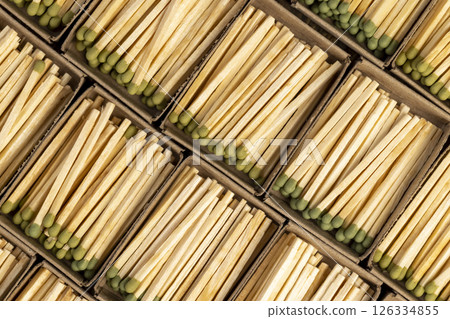 matchboxes with matches , matchboxes with new matches made of natural wood, closeup 126334855