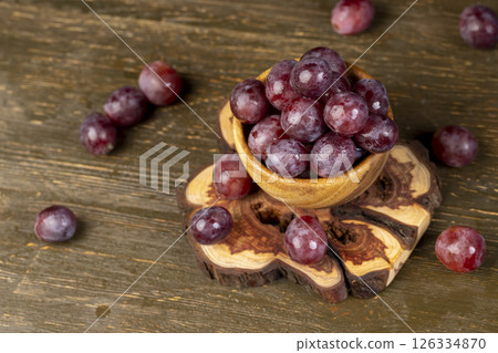 pink ripe grapes on the table after washing the berries pink ripe grapes on the table after washing the berries 126334870