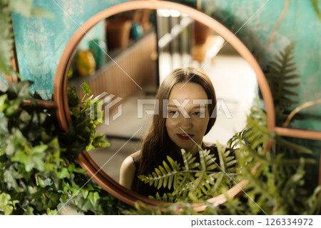 Experience a serene reflection within a natureinspired and beautifully crafted setting Experience a serene reflection within a natureinspired and beautifully crafted setting 126334972