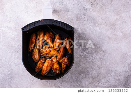 Chicken wings roasted in air fryer Chicken wings roasted in air fryer 126335332