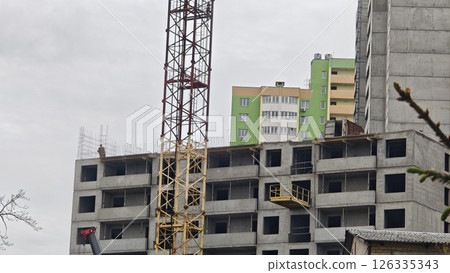 Multi-story concrete building under construction Multi-story concrete building under construction 126335343