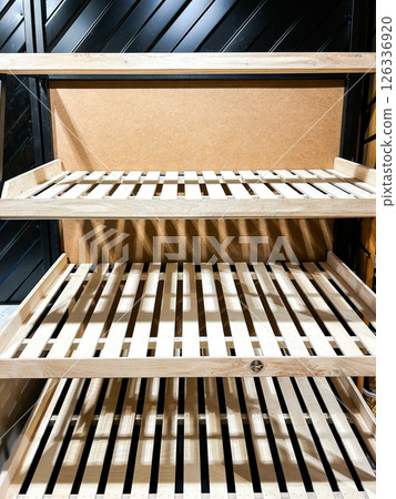 Empty shelves in local store, emphasizing famine and desperation in low-income communities. Powerful image for poverty, humanitarian aid, and political instability topics. 126336920