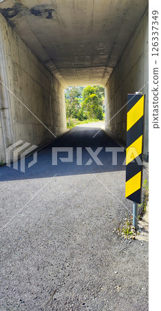 Close-up of emergency signs at the tunnel entrance in Portugal. road construction concept. safety engineering, warning signals, collapse 126337349