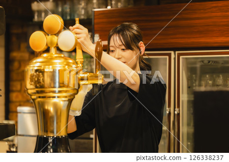 Woman working at a bar 126338237