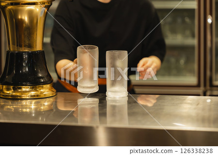 Woman working at a bar 126338238