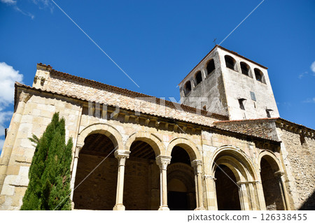 Medieval Church in limestone with arches, semicircular flares and Herrerian roof Medieval Church in limestone with arches, semicircular flares and Herrerian roof 126338455