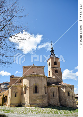 Medieval Church in limestone with arches, semicircular flares and Herrerian roof 126338458