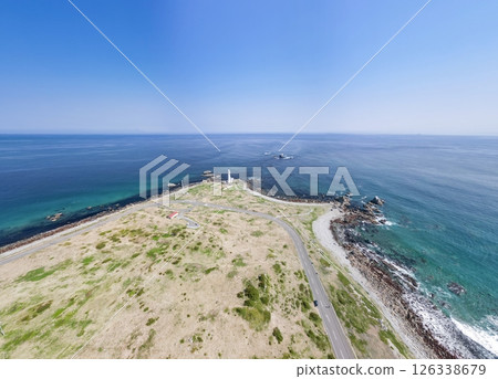 Aerial view of Shiriyazaki Lighthouse, the northernmost point of Honshu, Aomori Prefecture, Shimokita Peninsula 126338679