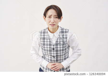 Female office worker bowing apologizing white background looking at camera 126340094