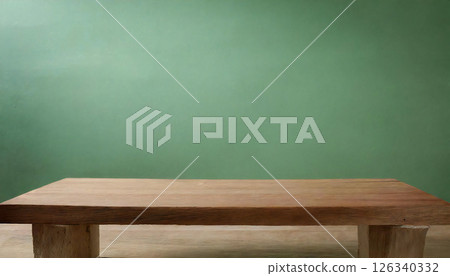 A simple table on a plain green background 126340332