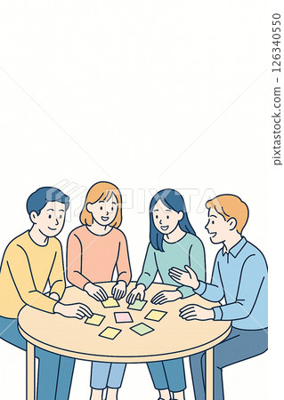 Four college students putting sticky notes on a desk 126340550