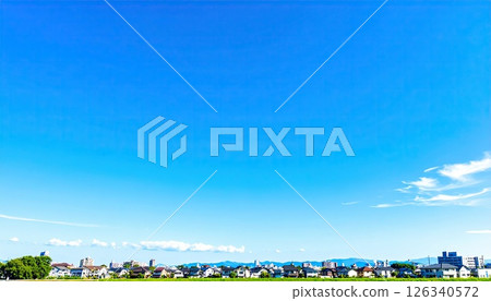 AI image: Image of a suburban residential area with a clear blue sky 126340572