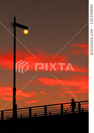 Street lights and sunset on the bridge 126340666