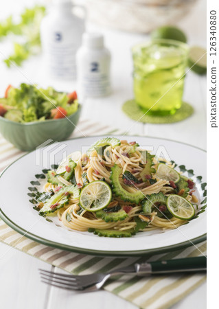 Bitter melon and plum pasta 126340880