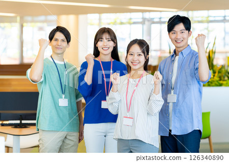 Young engineers working in an office. Photo courtesy of Denpa Gakuen, Tokyo Electronics College. Young engineers working in an office. Photo courtesy of Denpa Gakuen, Tokyo Electronics College. 126340890