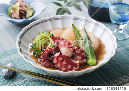 Softly simmered octopus and summer vegetables 126341826