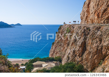 Aerial view of Kaputas beach with turquoise sea water and white sand, Lycia coast. Summer relaxing day at family vacation in Mediterranean Sea, Kas, Antalya region, Turkey Aerial view of Kaputas beach with turquoise sea water and white sand, Lycia coast. Summer relaxing day at family vacation in Mediterranean Sea, Kas, Antalya region, Turkey 126343466