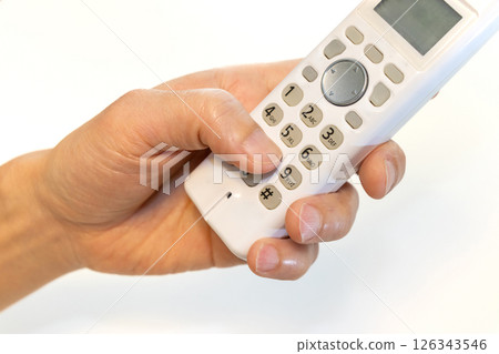 Press the button on the handset Press the button on the handset 126343546
