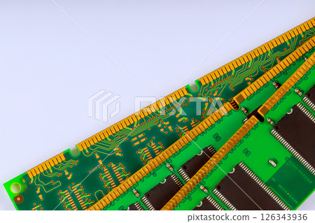Green circuit board RAM modules memory chips intricate wiring, ideal for electronic design Green circuit board RAM modules memory chips intricate wiring, ideal for electronic design 126343936