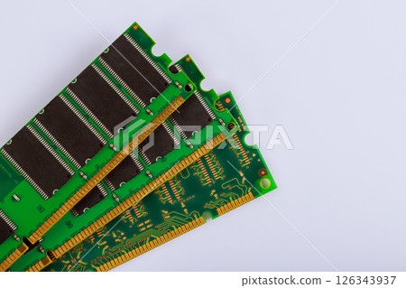 Various memory modules with green boards gold connectors, RAM modules technology. Various memory modules with green boards gold connectors, RAM modules technology. 126343937