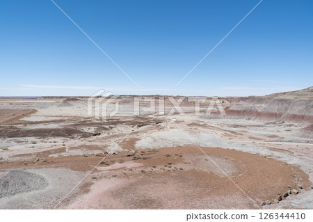 Eroded Desert Landscape at Petrified Forest National Park Under Clear Blue Sky Eroded Desert Landscape at Petrified Forest National Park Under Clear Blue Sky 126344410