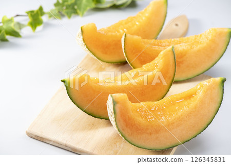 Fresh, sweet and delicious melons harvested from the field Fresh, sweet and delicious melons harvested from the field 126345831