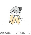 The upper body of a middle-aged woman sighing due to menopausal depression 126346365