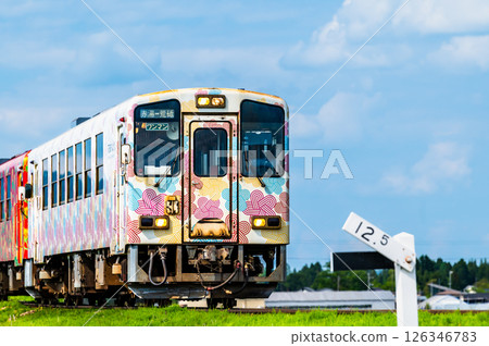 Yamagata Railway Flower Nagai Line: A train running through fields of fresh greenery (Shirato - Uzen Narita) Yamagata Railway Flower Nagai Line: A train running through fields of fresh greenery (Shirato - Uzen Narita) 126346783