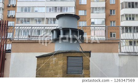 Industrial ventilation system extracting air in residential area 126347569
