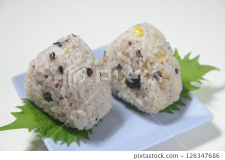 Multigrain rice balls on a plate 126347686