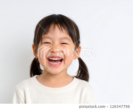 Portrait of a smiling Japanese girl on white background 126347798