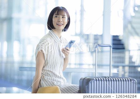 Travel A woman leaving on a trip 126348284