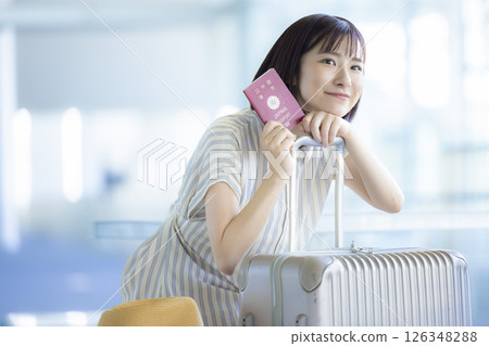 Travel A woman leaving for an overseas trip 126348288
