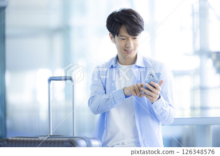 Travel: A man leaving on a trip 126348576
