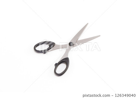 Scissors on a white background Scissors on a white background 126349040