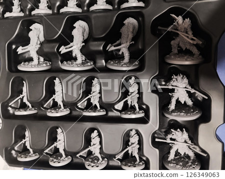 Mozyr, Belarus, 11.06.2024: Black Rose Wars, anti-hero action figures in a gray plastic corex top view. board games Mozyr, Belarus, 11.06.2024: Black Rose Wars, anti-hero action figures in a gray plastic corex top view. board games 126349063