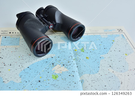 Binoculars for astronomical observation, astronomical observation images, star charts 126349263